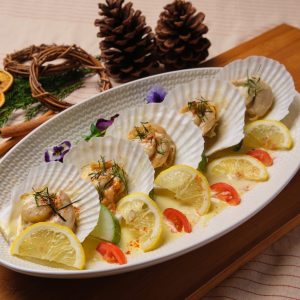 baked half shell scallop with kaffir lime garlic butter sauce