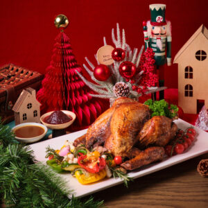 Herb Roasted Whole Turkey served with Tea-Infused Natural Jus and Ginger Cranberry Sauce