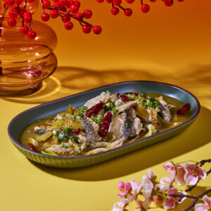 Premium Toman Fish cooked in Sichuan Spicy and Sour Broth with Pickle Mustard and Leek