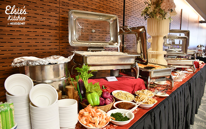 Decorated buffet catering spread for corporate event
